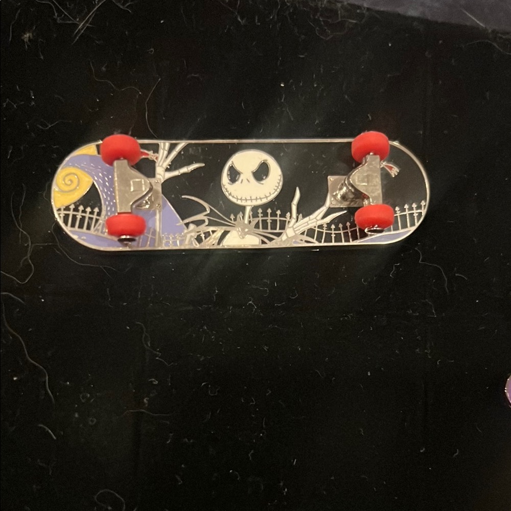 Nightmare Before Christmas Mini Skateboard with Red Wheels pin